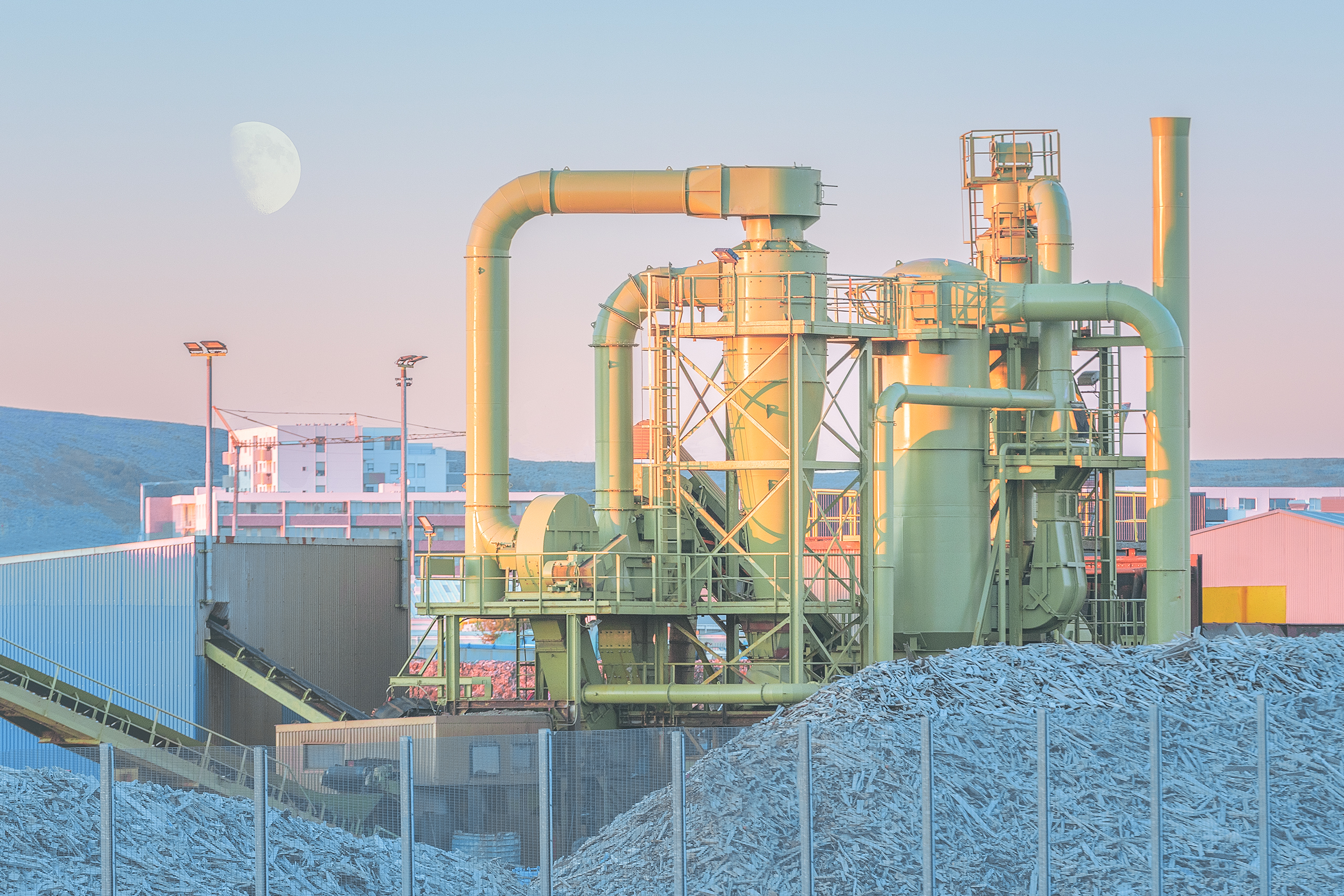 Fine art architecture photography of an industrial complex with moon in Iceland by Australian photographer, Serena Dzenis.